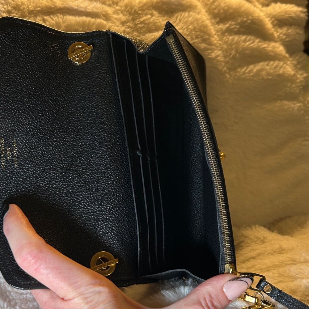 337. Louis Vuitton Saint Germain Pochette in Black Monogram Empreinte leather - Picture 9 of 14
